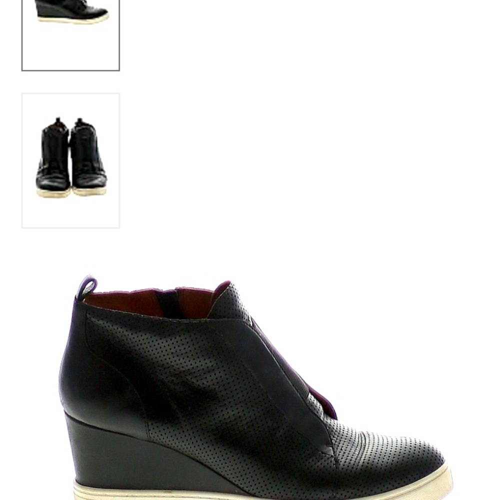 Black size 7 Medium leather wedge sneakers by lpaola brand.